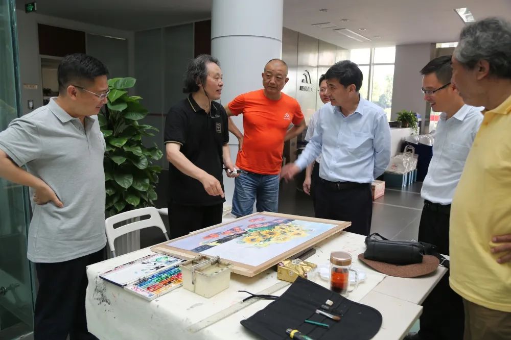 邗江政協(xié)藝術(shù)家慶賀邁安德二十耕耘